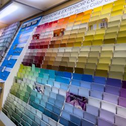Seattle, WA USA – circa December 2022: Angled view of paint swatch cards inside the paint department inside a Walmart store.
